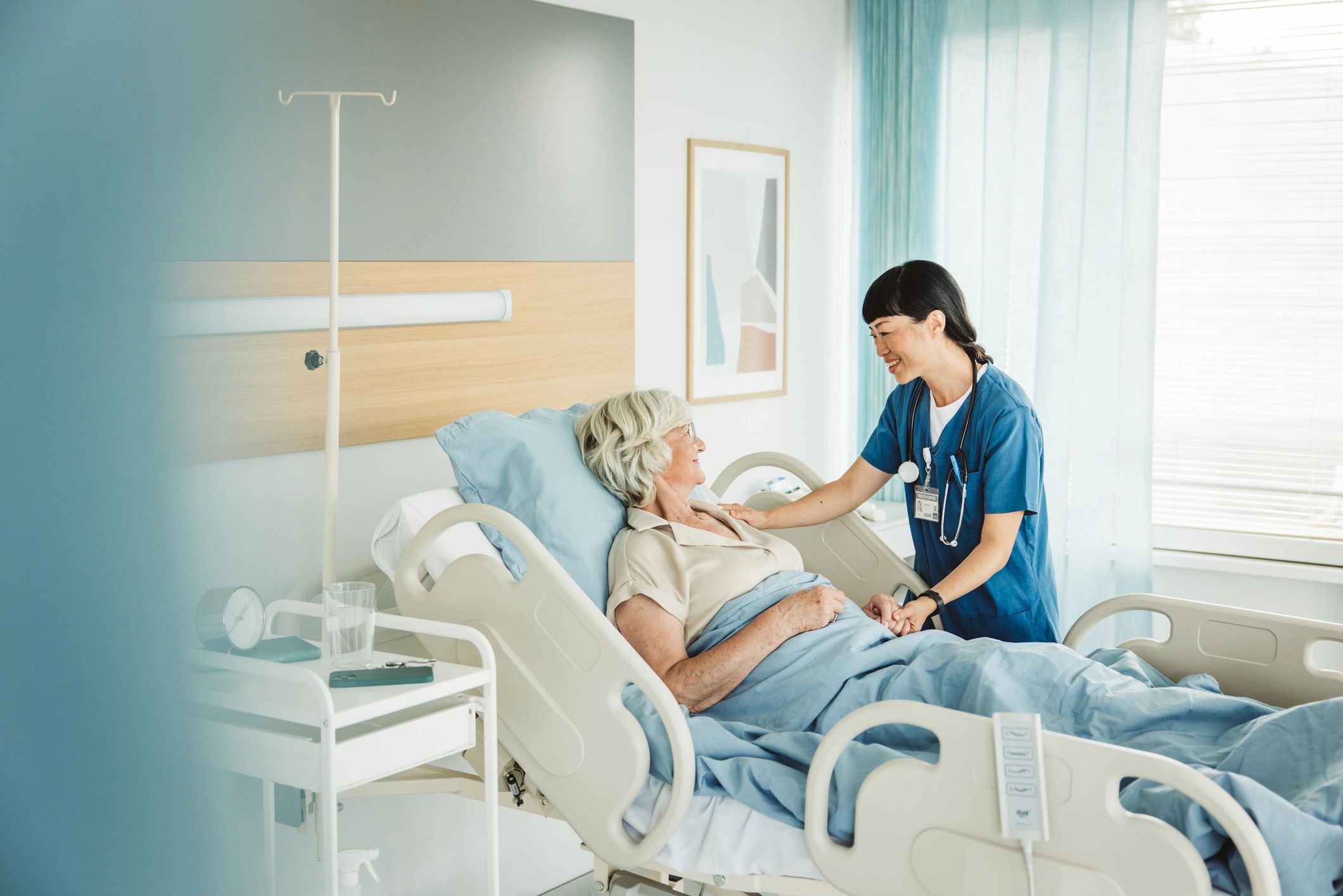 compassionate nurse helping senior