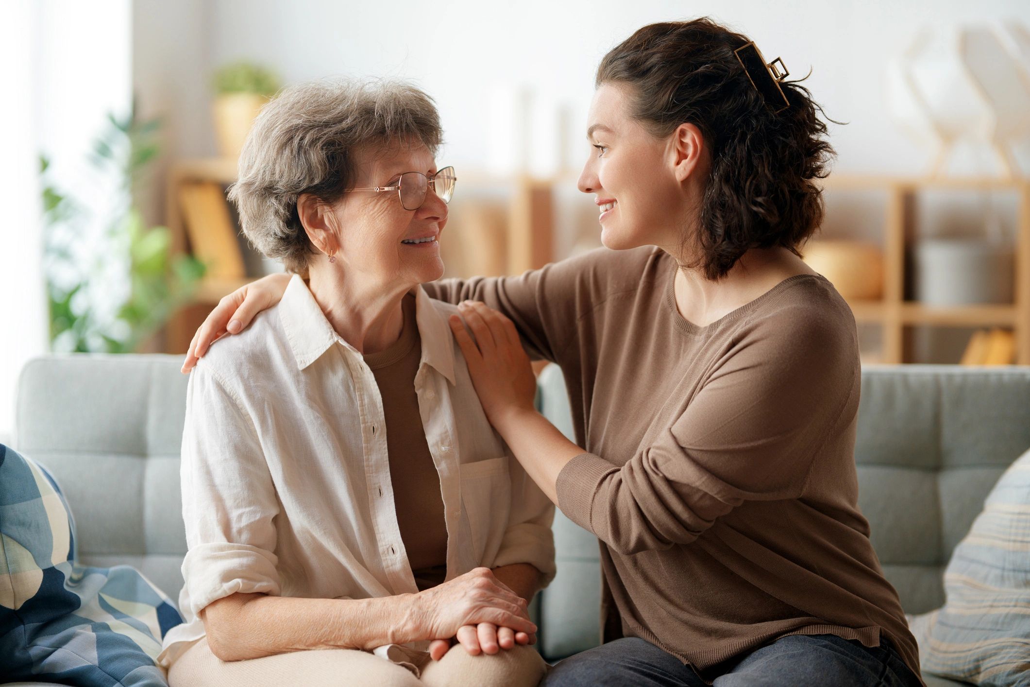 compassionate nurse helping senior